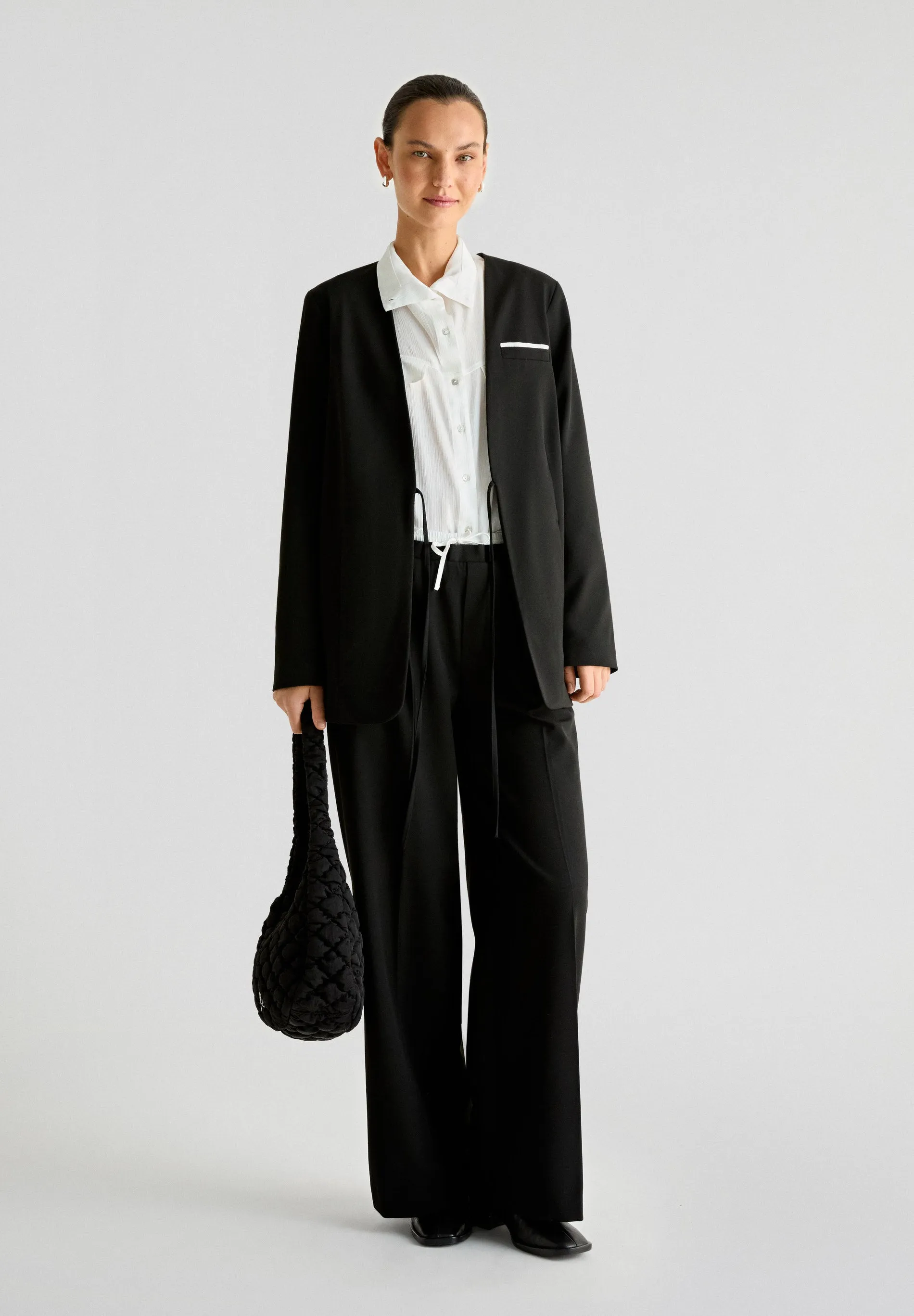 BLAZER WITH TIE AND POCKET DETAIL